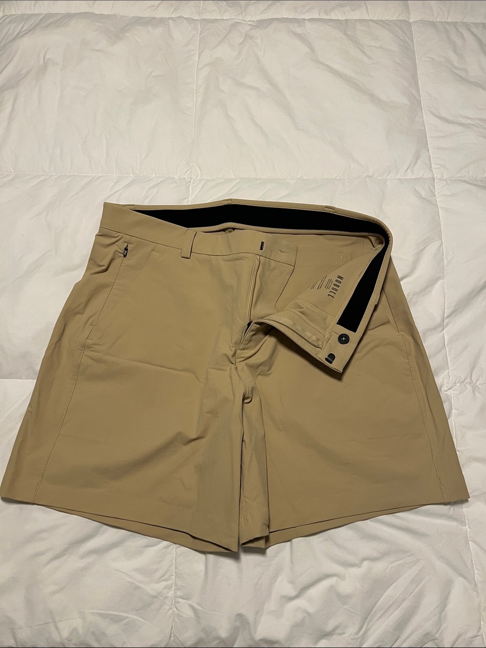 NOBULL Men's Tour Short Khaki Flat-Front Performance stretch 7”